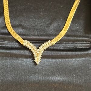 Elegant 14KT Yellow Gold Necklace with V shape double row of diamonds.
